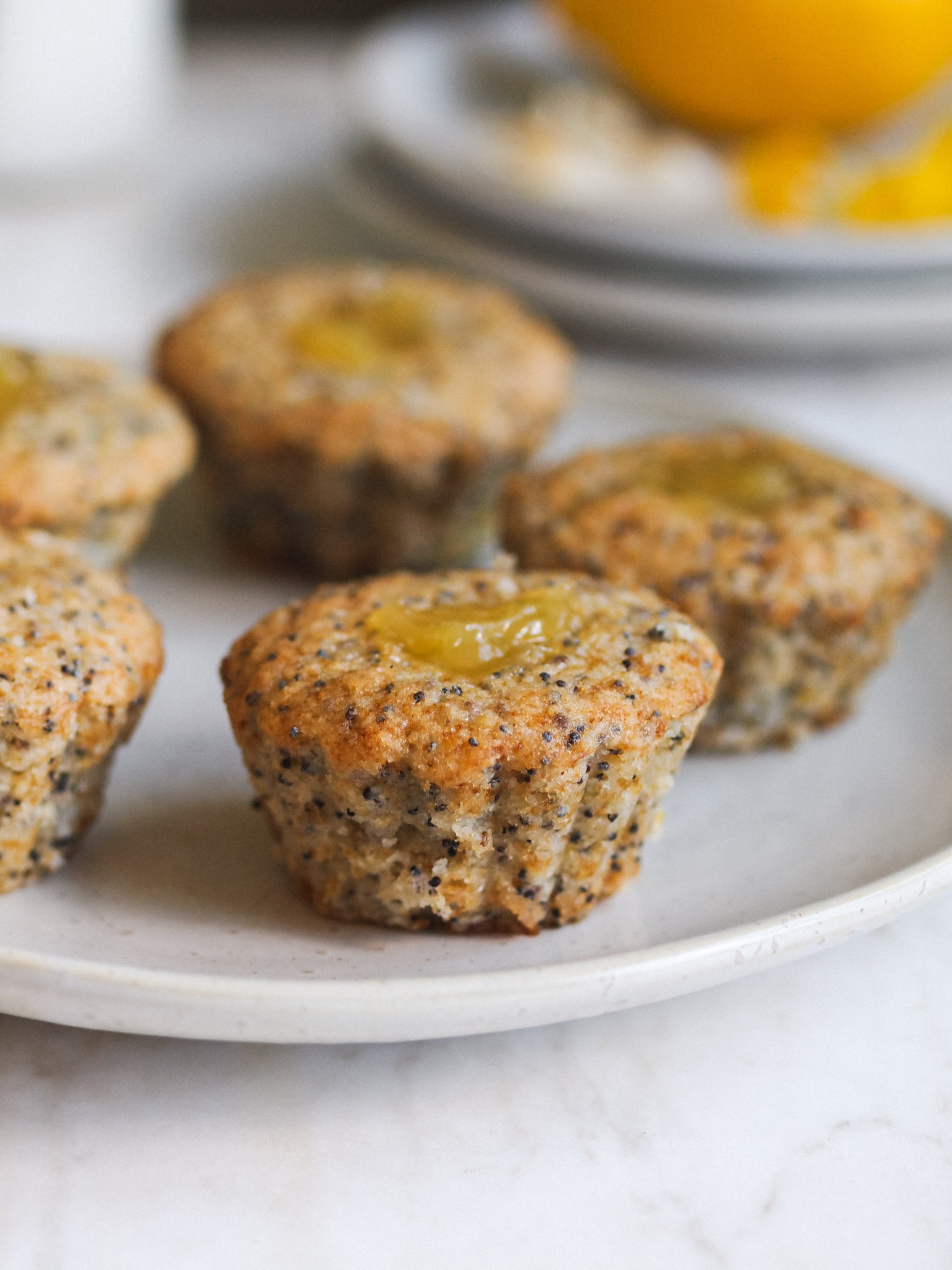 Lemon Poppy Seed Vegan Cupcakes with Coconut Frosting