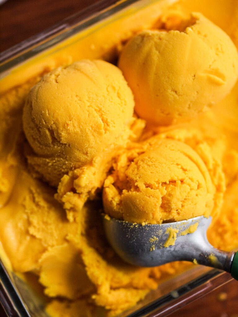 https://bakingmehealthy.com/wp-content/uploads/2022/12/Blood-Orange-Saffron-Vegan-Ice-Cream-with-Pistachios-13-768x1024.jpg